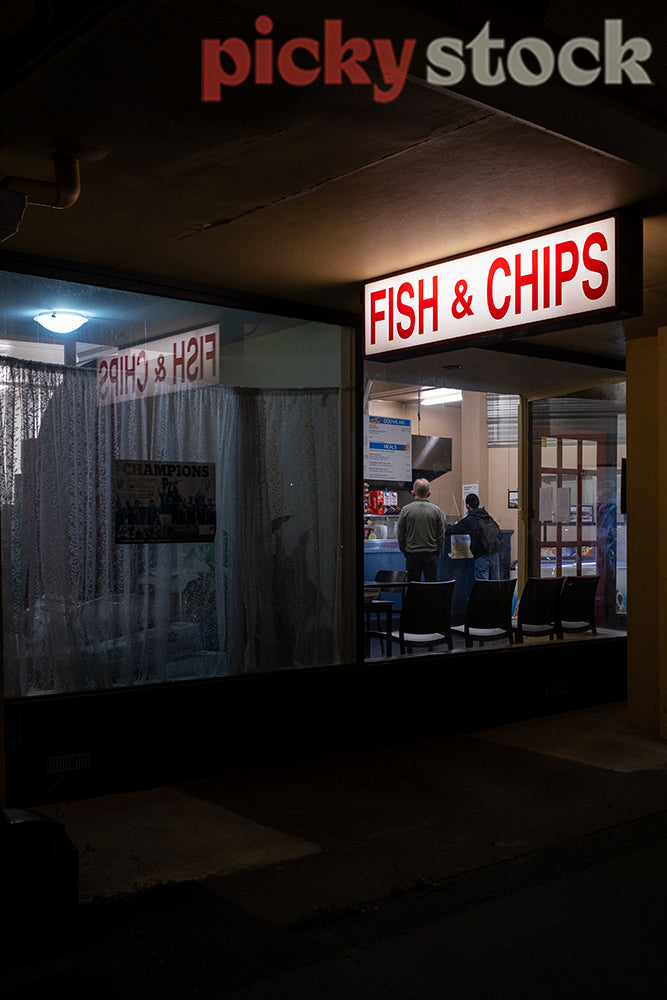 Fish and chip shop at night