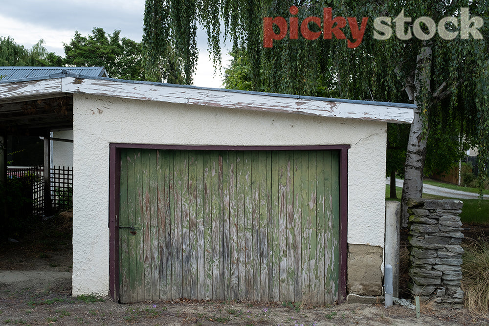 Old shed door with paint peeling off