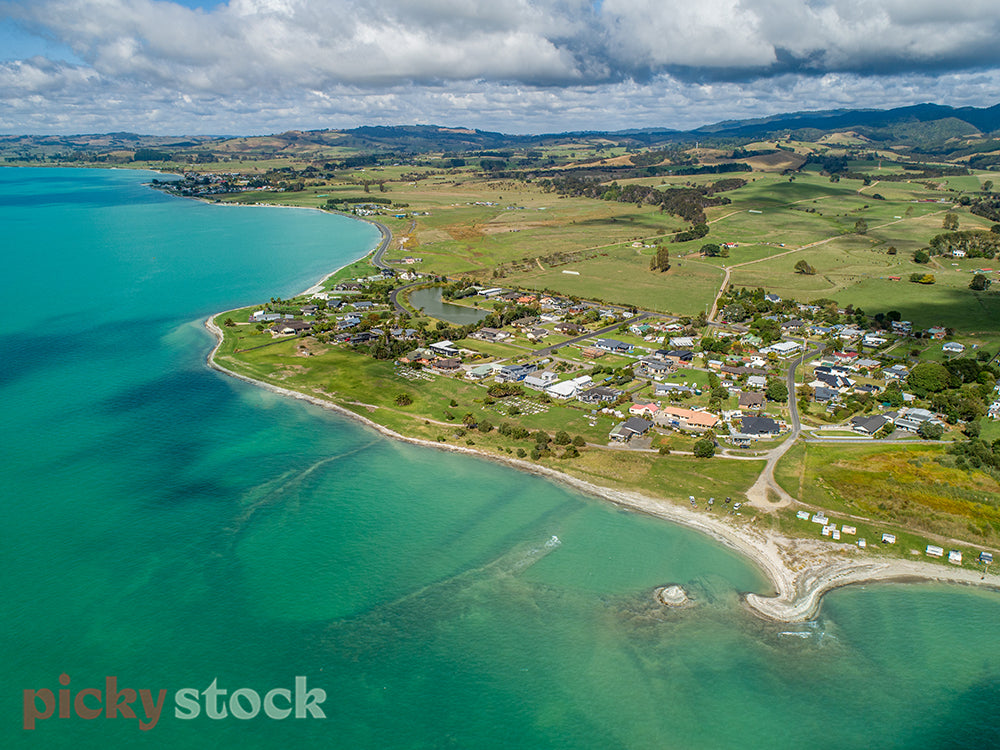 Aerial view of Kaiaua, Firth of Thames seeing the small rural township in Thames