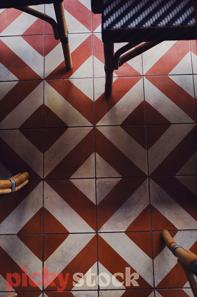 Decorative red and white tiled floor in restaurant 
