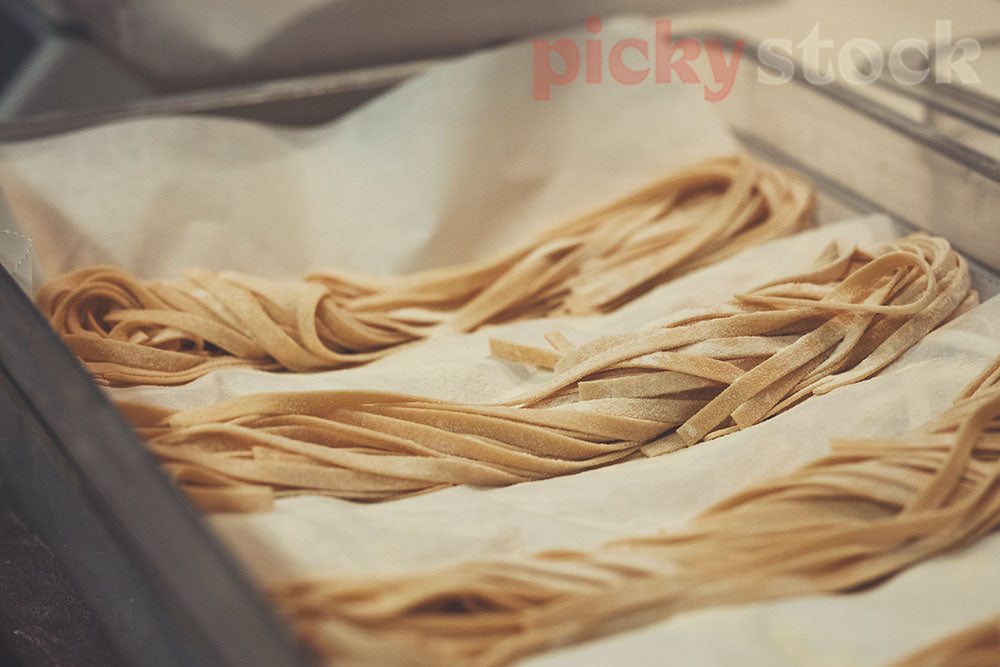 Fresh pasta lays fresh in Auckland kitchen, ready to cook. 