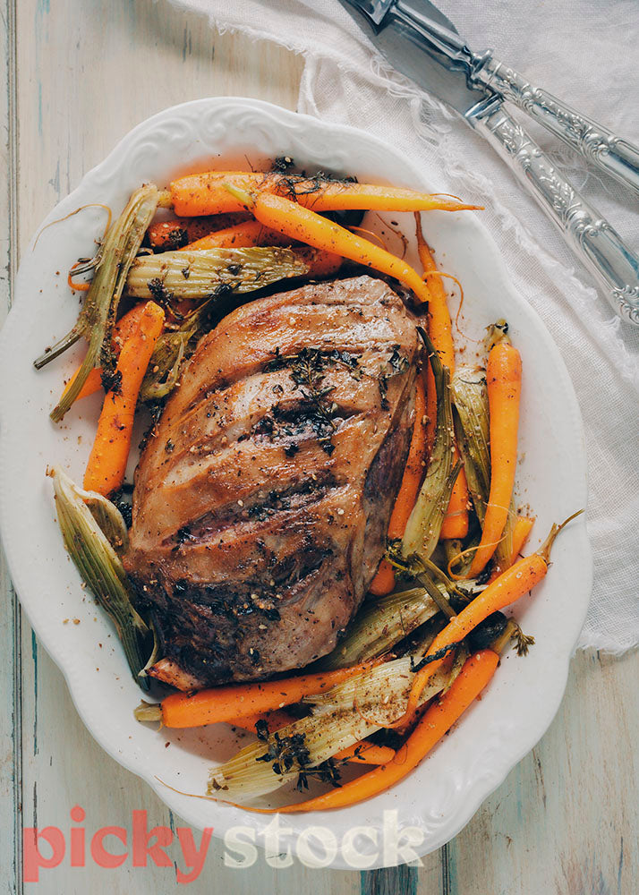 Roast lamb with baby spring carrots, fennel and dill