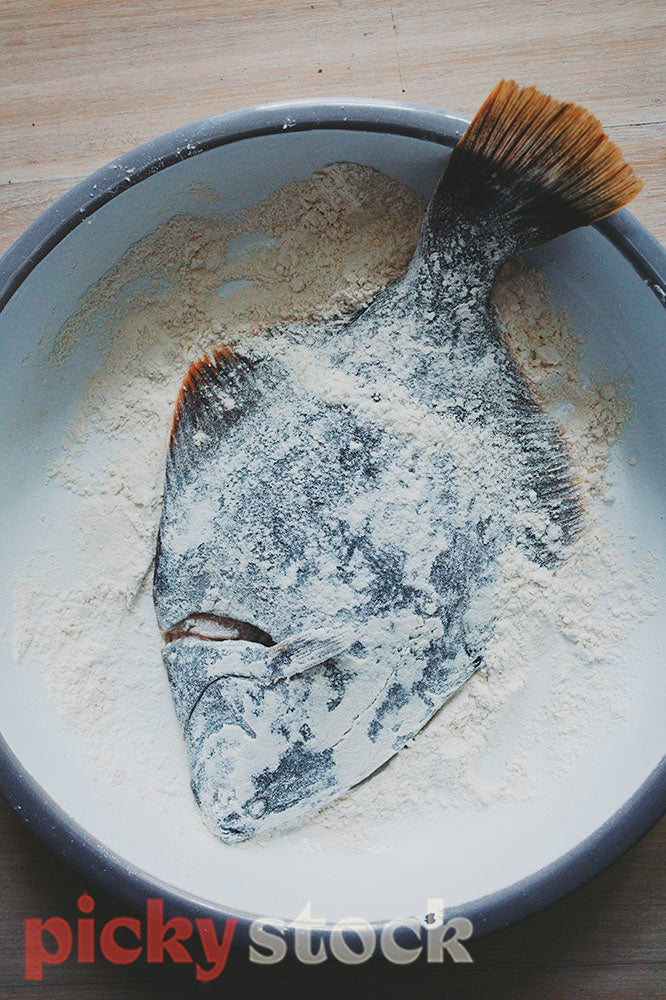 Flounder dusted with flour.