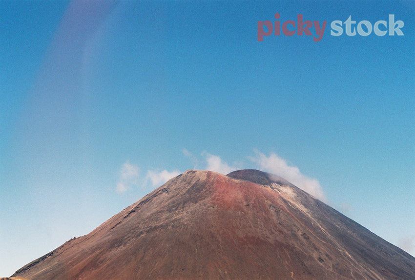 Tongariro maunga standing tall against a blue sky.