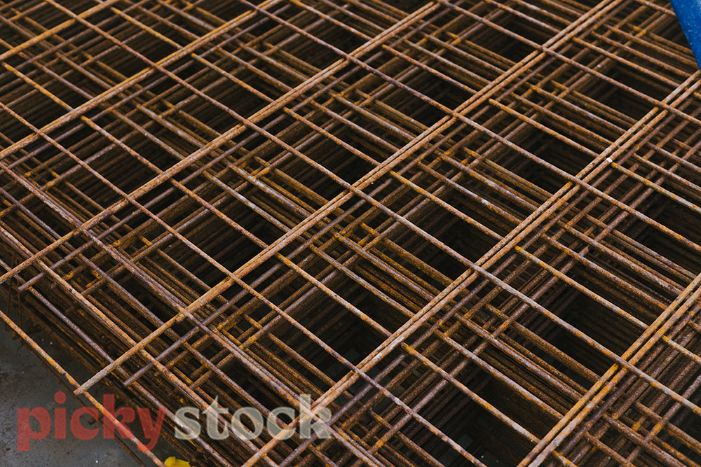 Graphic pattern of stacked steel for reinforcing concrete