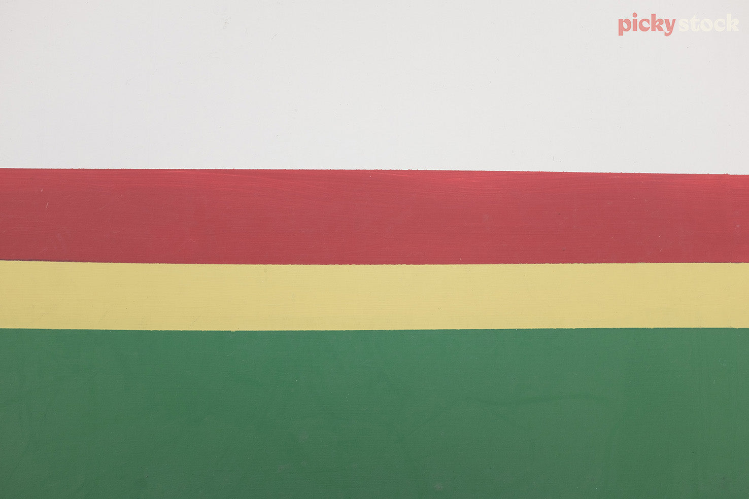 Shop wall with retro colour schem of white red yellow and green. 