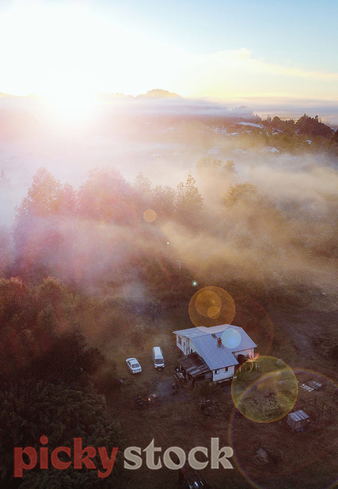 Taumaranui homestead in misty light.