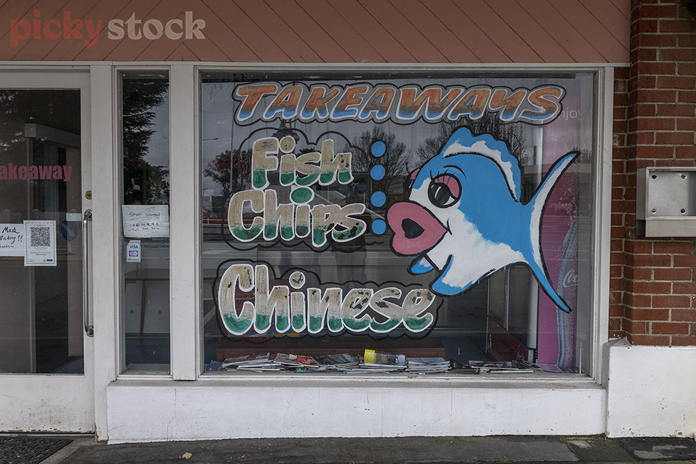 Big retro hand-painted mural on a fish & chip & Chinese take away store.